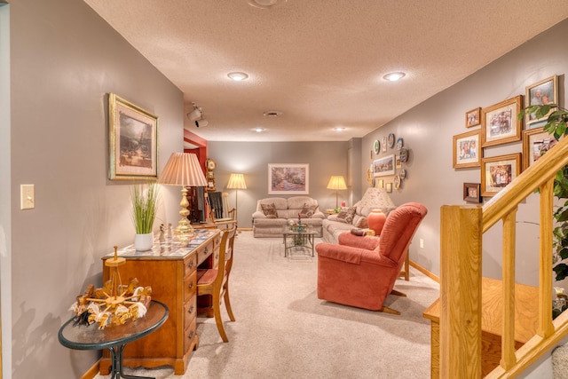33240 Gary Dr, Grand Rapids, MN 55744 - living room with light carpet, a textured ceiling, recessed lighting, and baseboards