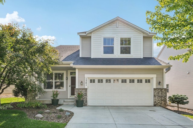 1741 Prescott Ln, Chaska, MN 55318 - view of front facade with concrete driveway, a garage, and a shingled roof