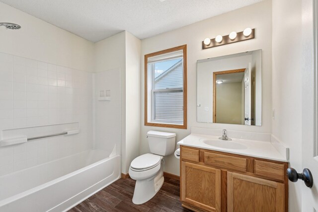 1741 Prescott Ln, Chaska, MN 55318 - bathroom with wood finished floors, vanity, toilet, bathtub / shower combination, and baseboards