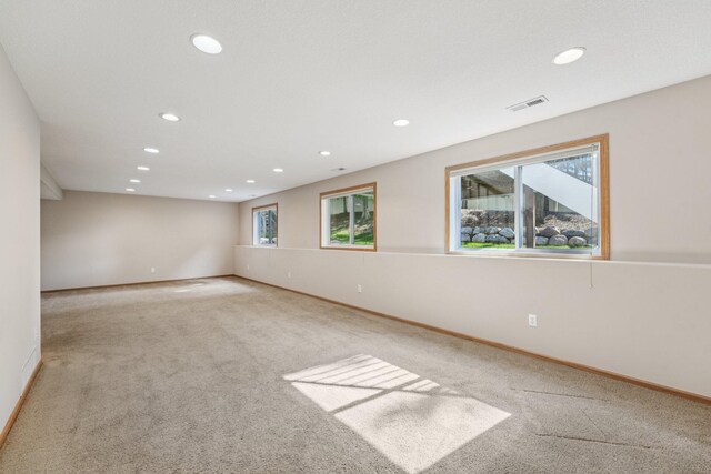 1741 Prescott Ln, Chaska, MN 55318 - carpeted spare room with plenty of natural light, recessed lighting, and baseboards