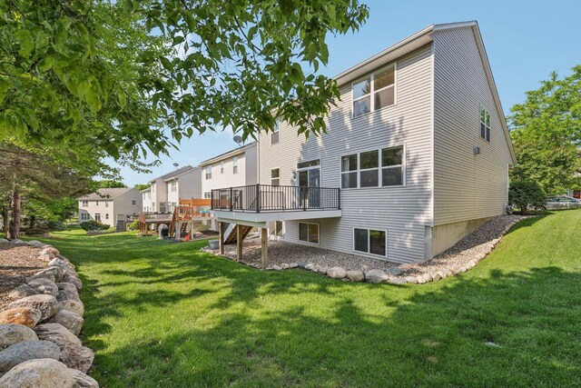 1741 Prescott Ln, Chaska, MN 55318 - back of property featuring a deck and a yard