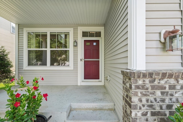 1741 Prescott Ln, Chaska, MN 55318 - view of exterior entry with a porch