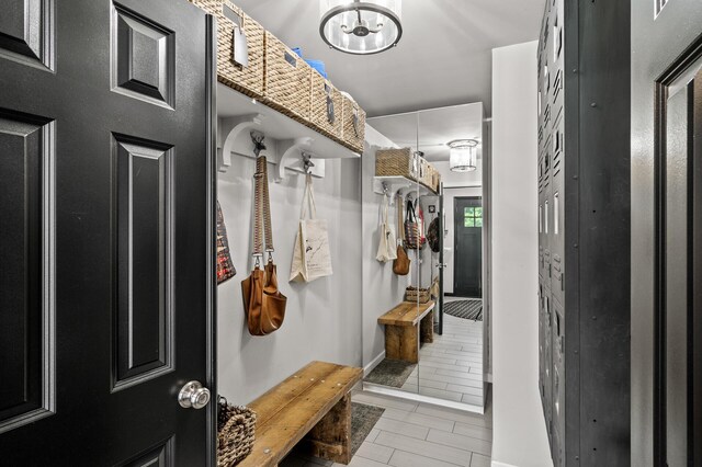 3717 80th Ave N, Brooklyn Park, MN 55443 - mudroom featuring a chandelier