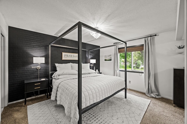 3717 80th Ave N, Brooklyn Park, MN 55443 - carpeted bedroom with a textured ceiling and baseboards