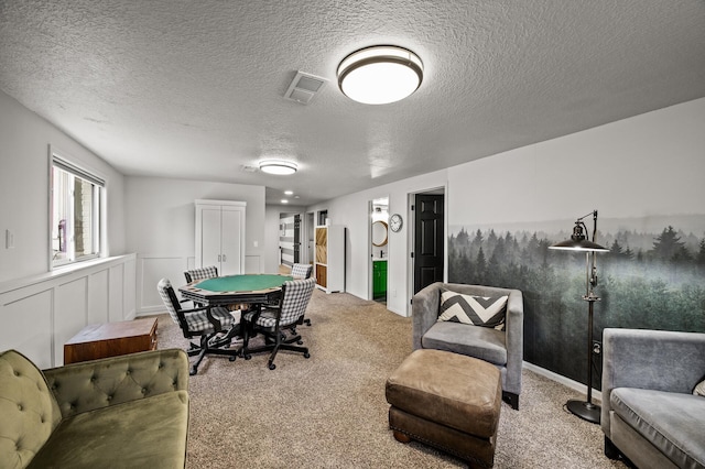3717 80th Ave N, Brooklyn Park, MN 55443 - recreation room with carpet floors and a textured ceiling