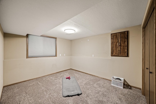 3717 80th Ave N, Brooklyn Park, MN 55443 - empty room featuring carpet floors, a textured ceiling, and baseboards