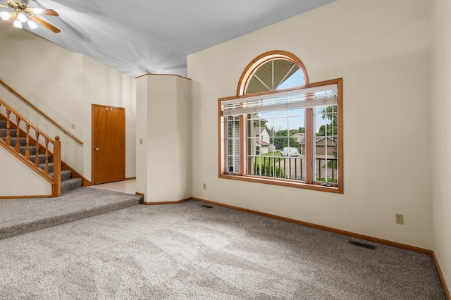 13842 Redwood St NW, Andover, MN 55304 - unfurnished room with carpet, a ceiling fan, stairs, and baseboards