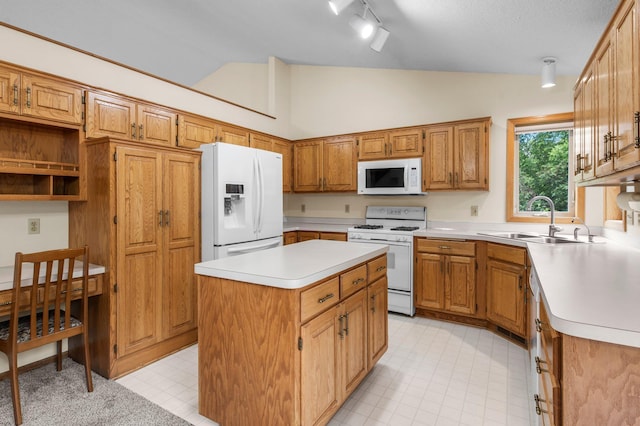 13842 Redwood St NW, Andover, MN 55304 - kitchen with white appliances, a sink, light countertops, a kitchen island, and brown cabinets