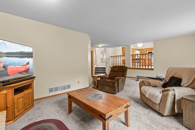 13842 Redwood St NW, Andover, MN 55304 - living area with light carpet, stairs, and baseboards