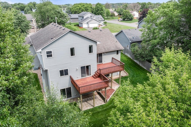 13842 Redwood St NW, Andover, MN 55304 - back of property with roof with shingles, a deck, and a residential view