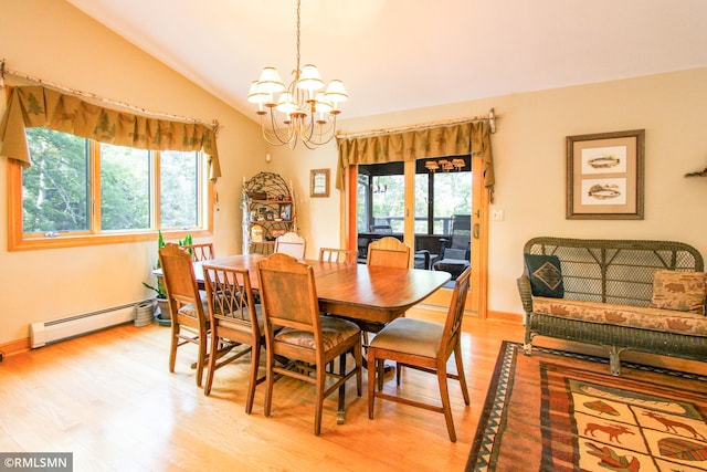 49063 203rd Pl, Mcgregor, MN 55760 - dining area featuring light wood-style flooring, a baseboard heating unit, a chandelier, vaulted ceiling, and baseboards