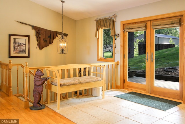 49063 203rd Pl, Mcgregor, MN 55760 - foyer featuring french doors, a chandelier, and wood finished floors