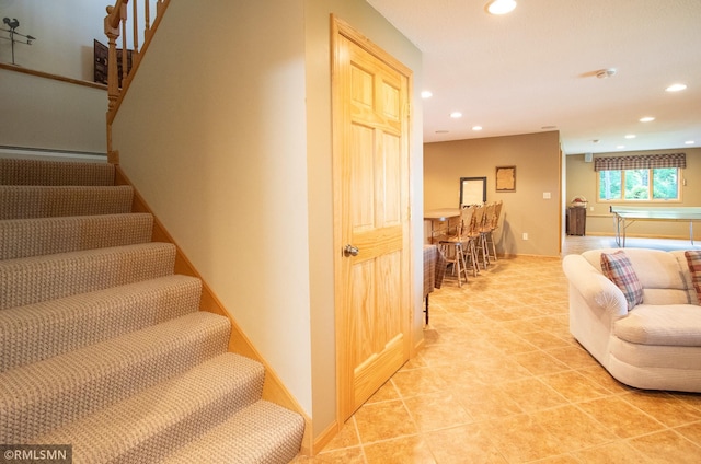 49063 203rd Pl, Mcgregor, MN 55760 - stairs featuring recessed lighting, tile patterned flooring, and baseboards