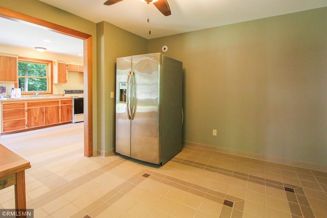 49063 203rd Pl, Mcgregor, MN 55760 - kitchen featuring stainless steel fridge with ice dispenser, electric stove, a sink, ceiling fan, and light countertops