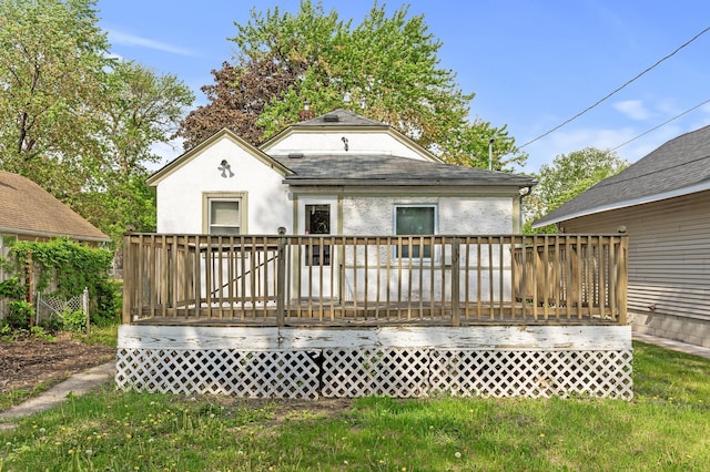 5420 Fremont Ave N, Brooklyn Center, MN 55430 - rear view of house featuring a wooden deck and stucco siding