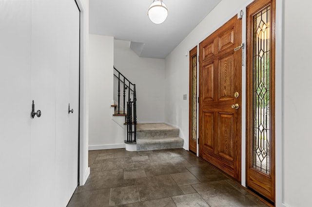 6521 Gleason Rd, Edina, MN 55439 - entrance foyer with stairway and stone finish flooring