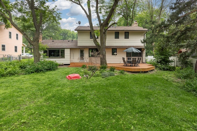 6521 Gleason Rd, Edina, MN 55439 - rear view of property featuring outdoor dining space, a chimney, and a wooden deck