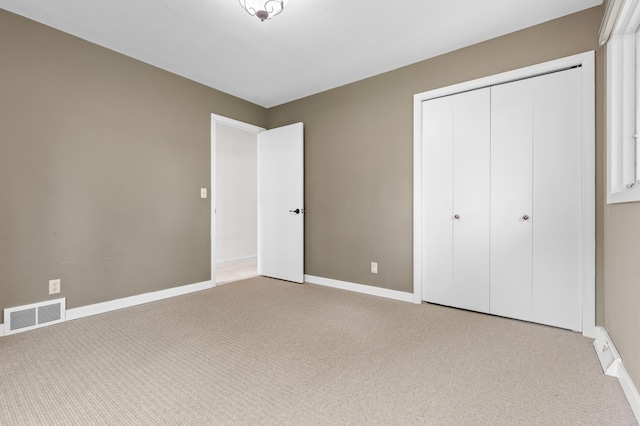 6521 Gleason Rd, Edina, MN 55439 - unfurnished bedroom with carpet floors and a closet