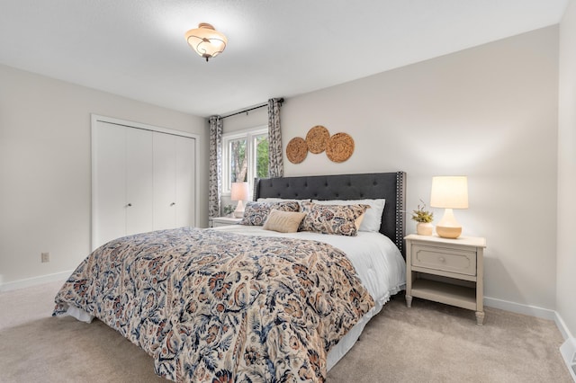 6521 Gleason Rd, Edina, MN 55439 - carpeted bedroom featuring a closet and baseboards