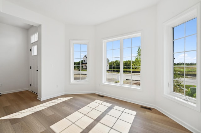 10633 29th St NE, Saint Michael, MN 55376 - unfurnished room featuring light wood finished floors and baseboards