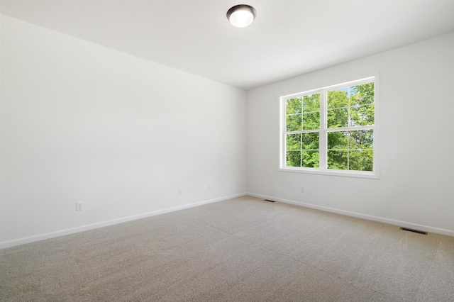 10633 29th St NE, Saint Michael, MN 55376 - unfurnished room featuring baseboards and light carpet