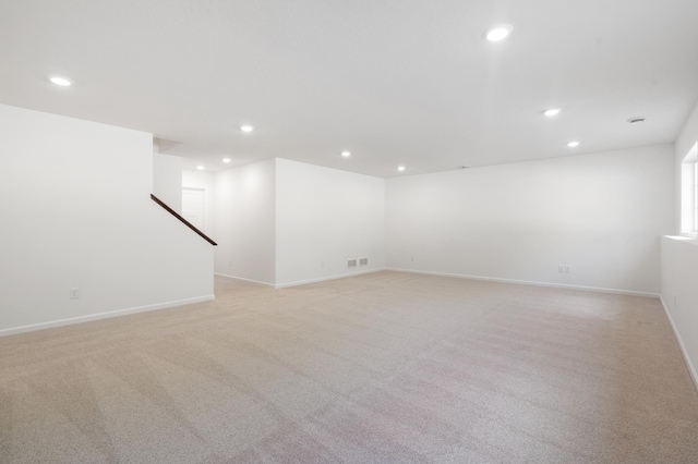 10633 29th St NE, Saint Michael, MN 55376 - unfurnished room with recessed lighting, light colored carpet, baseboards, and stairs