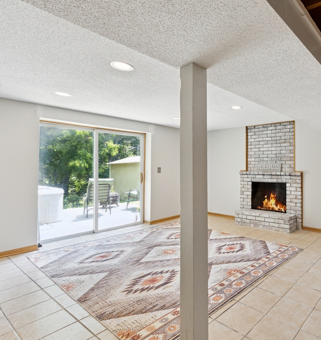 4616 Fillmore Ave NW, Maple Lake Twp, MN 55358 - tiled living area with a brick fireplace, a textured ceiling, recessed lighting, and baseboards