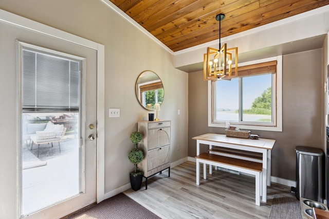 4616 Fillmore Ave NW, Maple Lake Twp, MN 55358 - dining space with wood ceiling, a chandelier, baseboards, light wood-style flooring, and crown molding