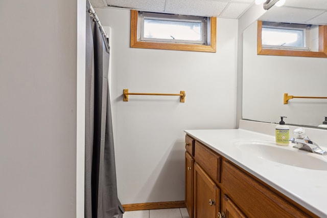 4616 Fillmore Ave NW, Maple Lake Twp, MN 55358 - full bath featuring vanity, tile patterned flooring, a shower with curtain, and baseboards