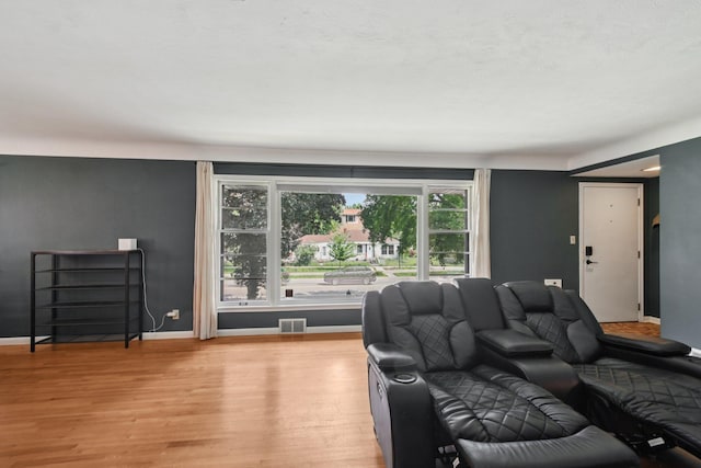 1346 Como Ave, Saint Paul, MN 55108 - living area with light wood-type flooring and baseboards