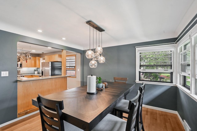 1346 Como Ave, Saint Paul, MN 55108 - dining space with light wood-style floors, a chandelier, and recessed lighting