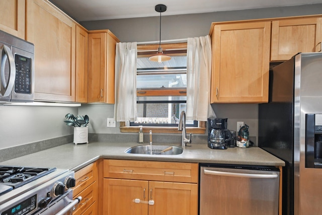1346 Como Ave, Saint Paul, MN 55108 - kitchen featuring stainless steel appliances, decorative light fixtures, and light countertops