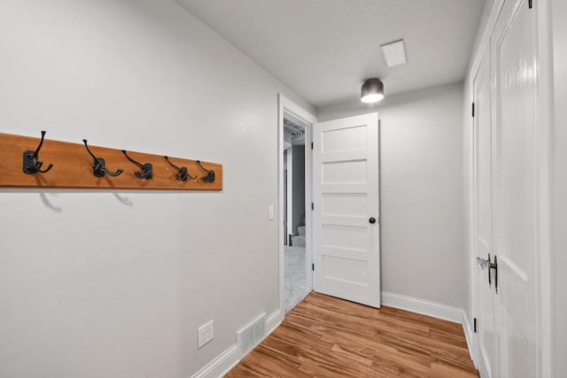 1346 Como Ave, Saint Paul, MN 55108 - hall with light wood-style flooring and baseboards