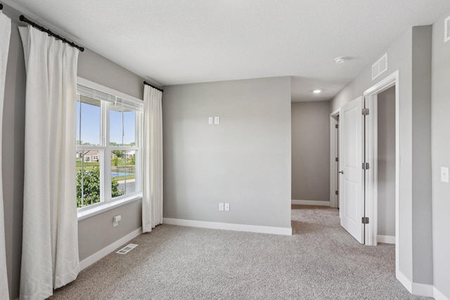 11505 Pineridge Way N, Dayton, MN 55327 - carpeted spare room featuring a smoke detector and recessed lighting