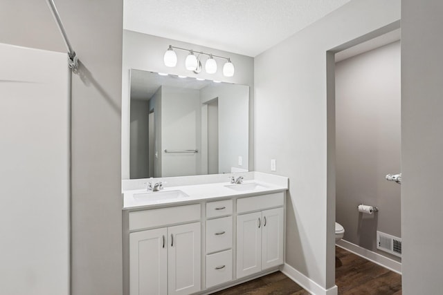 11505 Pineridge Way N, Dayton, MN 55327 - full bath featuring double vanity and wood finished floors