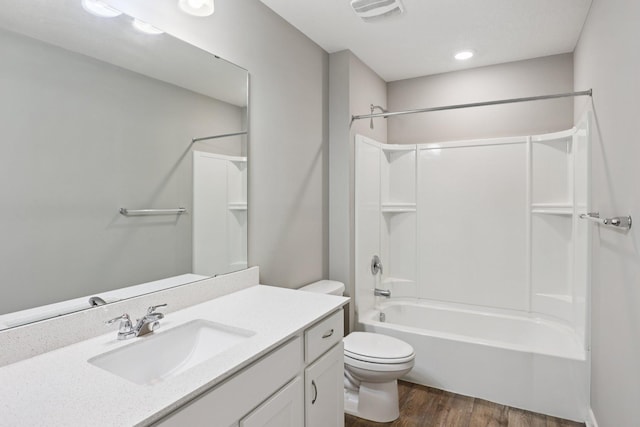 11505 Pineridge Way N, Dayton, MN 55327 - bathroom featuring wood finished floors, vanity, and tub / shower combination