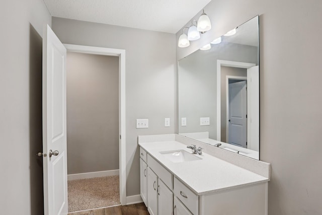 11505 Pineridge Way N, Dayton, MN 55327 - bathroom with vanity and wood finished floors