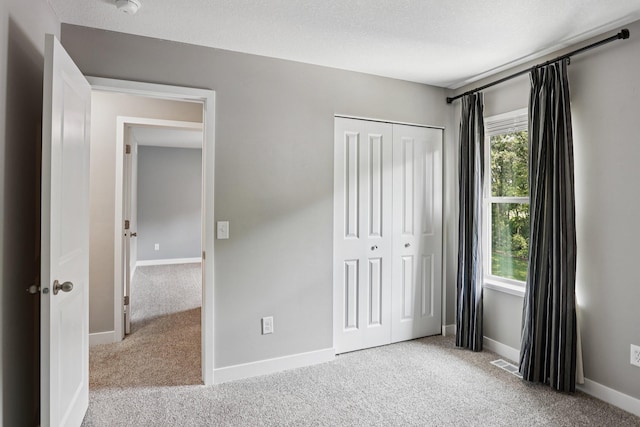 11505 Pineridge Way N, Dayton, MN 55327 - unfurnished bedroom featuring carpet floors and a closet