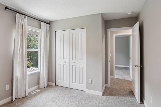 11505 Pineridge Way N, Dayton, MN 55327 - unfurnished bedroom with carpet and a closet