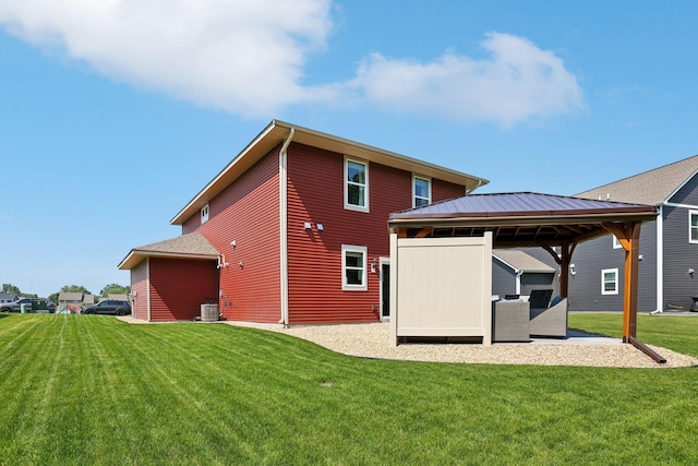 11505 Pineridge Way N, Dayton, MN 55327 - back of house with a gazebo, a yard, a patio, and an outdoor living space