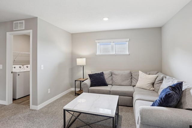 11505 Pineridge Way N, Dayton, MN 55327 - living room with washer and dryer and light colored carpet