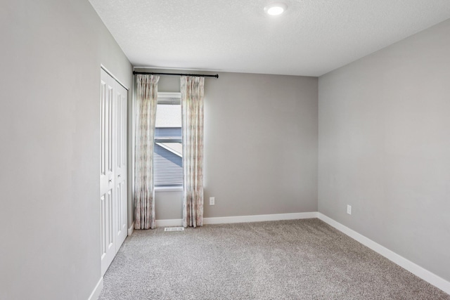 11505 Pineridge Way N, Dayton, MN 55327 - empty room with carpet and a textured ceiling