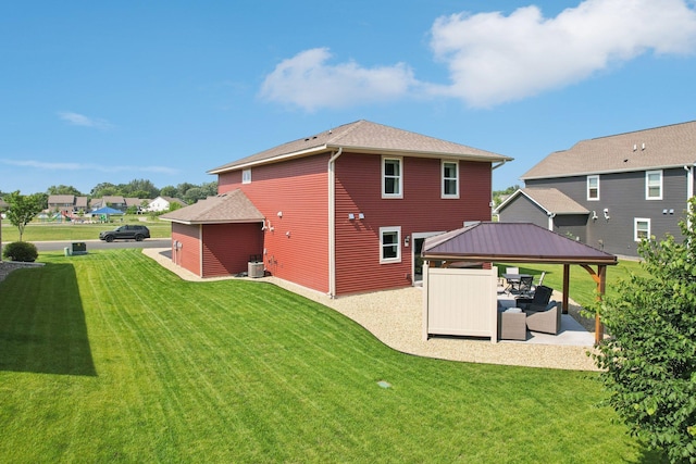 11505 Pineridge Way N, Dayton, MN 55327 - back of house featuring a gazebo, a patio, a yard, roof with shingles, and an outdoor living space