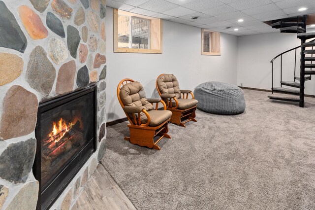 6860 Re Echo Ridge Dr NE, Remer, MN 56672 - sitting room with stairway, baseboards, recessed lighting, a fireplace, and carpet floors