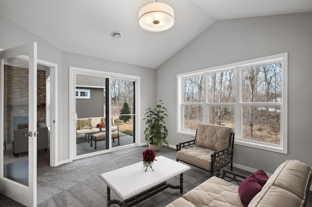 11183 184th Cir NW, Elk River, MN 55330 - living area with lofted ceiling, carpet, french doors, and baseboards