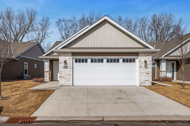 11183 184th Cir NW, Elk River, MN 55330 - craftsman-style home featuring stone siding, driveway, and board and batten siding