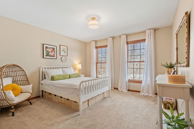 9256 Gateway Ln, Eden Prairie, MN 55347 - bedroom featuring light carpet and baseboards