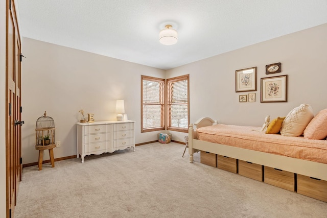 9256 Gateway Ln, Eden Prairie, MN 55347 - bedroom featuring light carpet and baseboards
