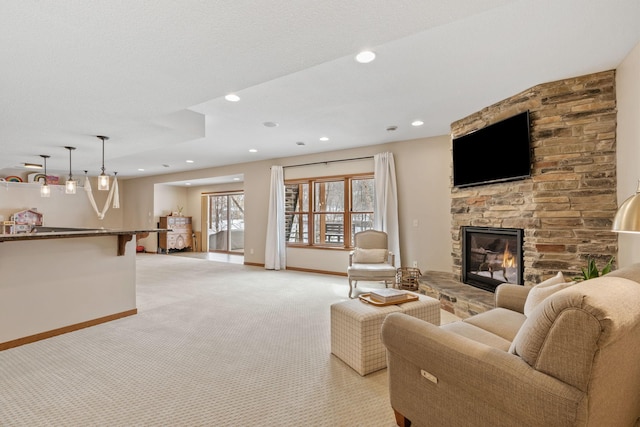 9256 Gateway Ln, Eden Prairie, MN 55347 - living room featuring light colored carpet, baseboards, a fireplace, and recessed lighting