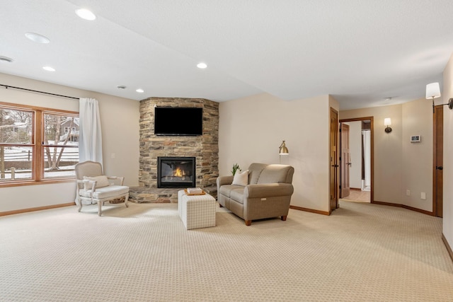 9256 Gateway Ln, Eden Prairie, MN 55347 - living room featuring light carpet, baseboards, a stone fireplace, and recessed lighting
